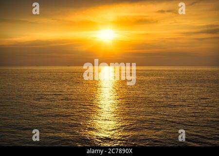 Beautiful colors of the sky at sunset over the sea Stock Photo