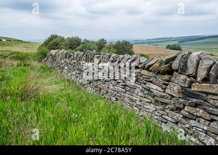 Dry stone wall on the moors. Stock Photo