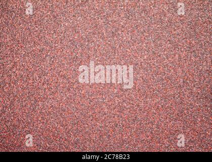 Coarse emery paper texture. In a red purple version. Stock Photo