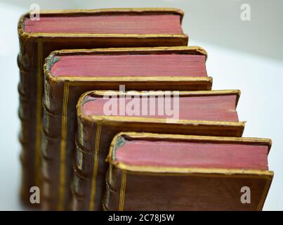 Old leather bound books, top view. Stock Photo