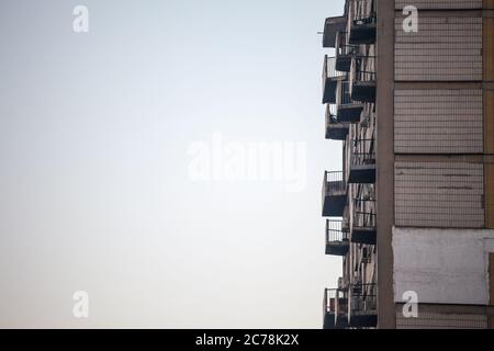 Balconies on Communist housing buildings, in decay & diplapidated condition in Belgrade, Serbia. These towers are a symbol of Socialist architecture a Stock Photo