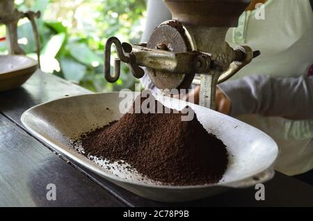 Freshly Roasted Coffee being Ground - Salento, Colombia Stock Photo