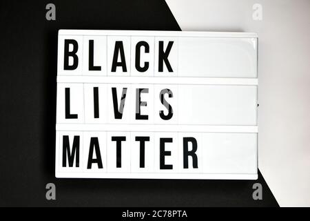 BLACK LIVES MATTER text on a black and white background. Freedom of Speech Vintage Retro quote board. Protest against the end of racism, anti-racism Stock Photo