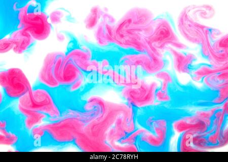Blue and red abstract background from mixed liquids and paints. Stock Photo