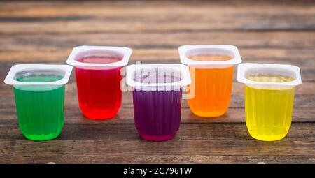 Multi Coloured fruit jelly in the plastic cups Stock Photo