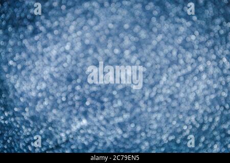 blue blurred abstract textured fabric background. selective focus. Stock Photo