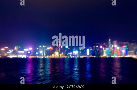 blurred lights of Hong Kong skyline from Victoria Harbor Stock Photo