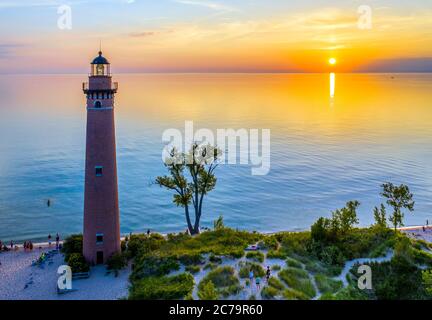 Aerial view of Little Sable Point Lighthouse at sunset over Lake Michigan; Mears, Michigan; Silver Lake State Park