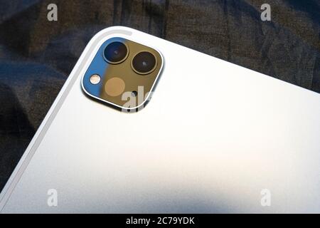 Set of Two Cameras and Scanner – camera module on the back side of a modern silver tablet Stock Photo
