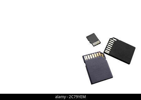 three memory cards lie on a white surface. Media concept. Memory for gadgets and devices. Advertising space Stock Photo