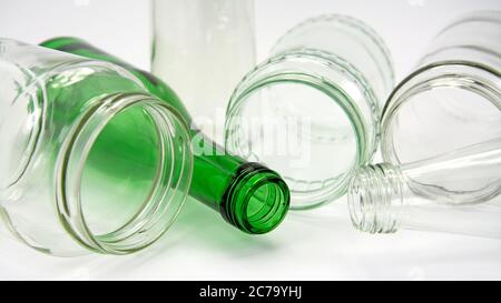 Old empty bottles and glasses for recycling Stock Photo
