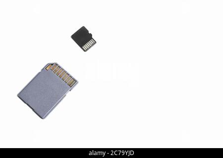 Flash SD cards of different sizes isolated on a white background. Memory cards for digital files with copy space for text Stock Photo
