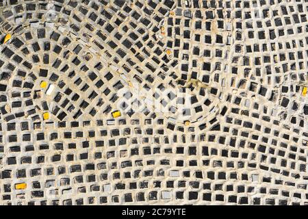 Abstract black and yellow Mosaic Pattern on a white background. Abstract mosaic colored ceramic stones Stock Photo