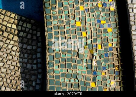 Artistic mosaic background. geometric shapes texture. green, yellow, blue and white colored mosaic tiles Stock Photo