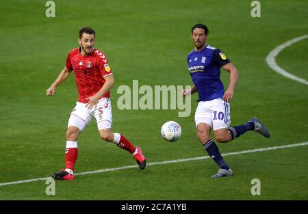 Charlton Athletic's Tom Lockyer (left) and Birmingham City's Lukas Jutkiewicz battle for the ball during the Sky Bet Championship match at St Andrew's Trillion Trophy Stadium, Birmingham. Stock Photo