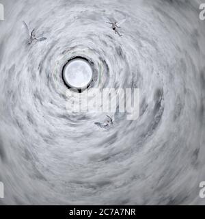 Angels soars in tunnel of clouds Stock Photo