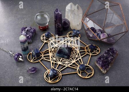 Crystals for healing, fortune telling and astrologhy on dark background. Esoteric and life coaching concept. Stock Photo