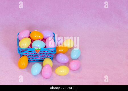 Festive Easter decorations and pink background. Stock Photo