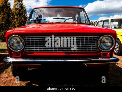 Front of red Soviet Lada passenger car displayed during annual Lilac festival in Dobele. Stock Photo