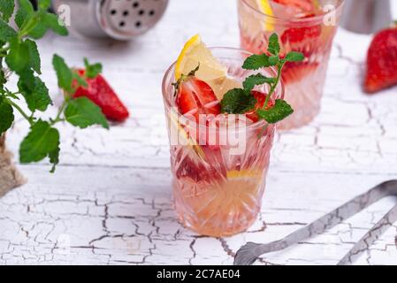 Summer strawberry lemonade with lemon Stock Photo