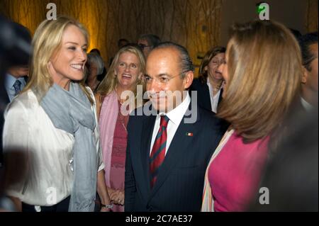 President Felipe Calderon of Mexico and wife Margarita Zavala attending the premiere party for Mexico The Royal Tour in downtown Los Angeles with Sharon Stone Stock Photo