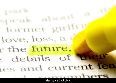 Word future is select in yellow marker on paper. Stock Photo