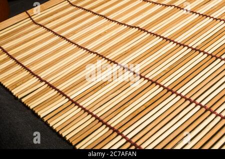 brown bamboo Mat - stand food, close-up, macro Stock Photo
