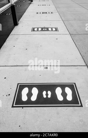 Social Distancing signs are a common sight in New York City due to the coronavirus, USA Stock Photo