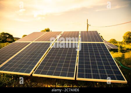 Small Solar Panel Setup Installed, Summer Heat , Green environment. Stock Photo