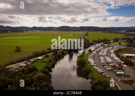 Coquille River flowing through green valleys, Oregon.  Stock Photo