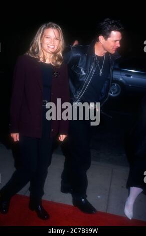 CHRIS ISAAK with Bridget Fonda.From Dusk Till Dawn premiere at Cinerama ...