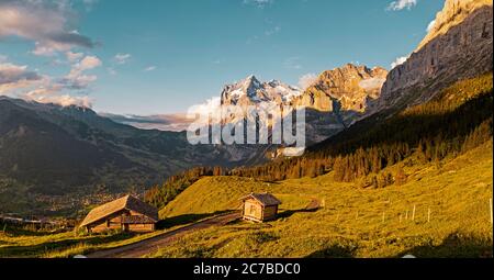 Aerial view of  small alpine mountain huts in the high alps of the grindelwald valley in Switzerland. Stock Photo