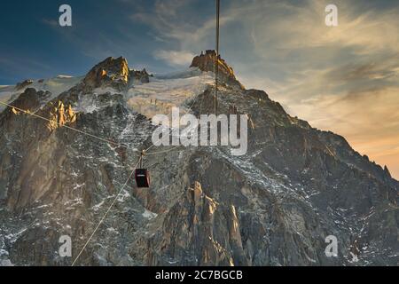 Aiguille du Midi, high mountain in the Mont Blanc Massif of the French Alps. Cable Car from Chamonix to the summit of Aiguille du Midi. Stock Photo