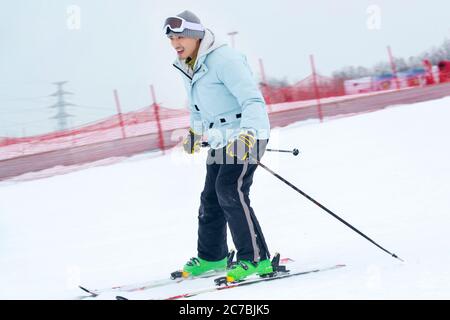 Ski resorts are skiing on the young man Stock Photo