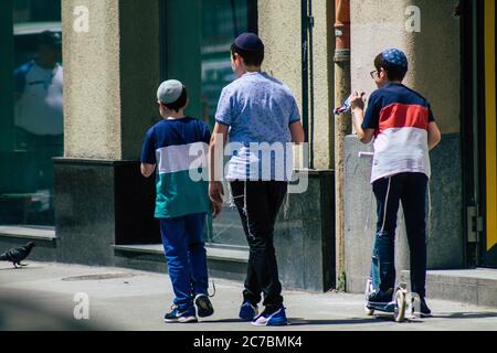 Budapest Hungary july 15, 2020 View of unidentified Jewish kids walking front the Great Synagogue of Budapest Stock Photo