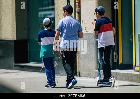 Budapest Hungary july 15, 2020 View of unidentified Jewish kids walking front the Great Synagogue of Budapest Stock Photo