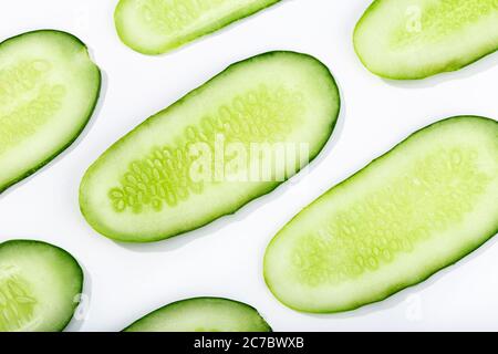 Cucumber slices pattern isolated on white background. Cucumis sativus background Stock Photo