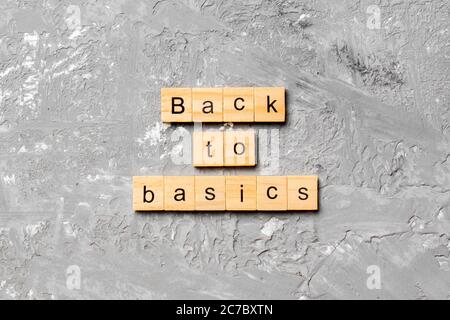 back to basics word written on wood block. back to basics text on table, concept. Stock Photo