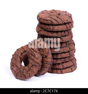 Heap of chocolate round cookies with heart-shaped hole isolated over white background Stock Photo