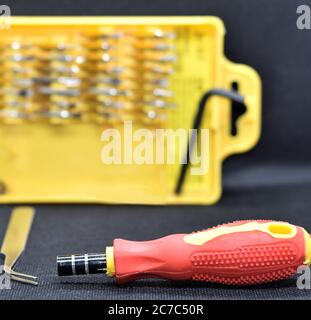 Multiple set of screwdrivers allows to open cover of any component or accessories easily and without damage Stock Photo