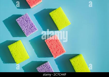 Cleaning sponges for washing dishes on blue background i Stock Photo