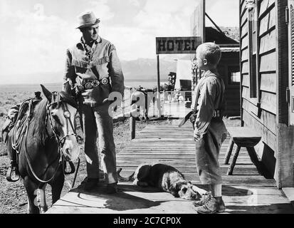 Alan Ladd and Brandon De Wilde in Shane - Promotional Movie Picture Stock Photo