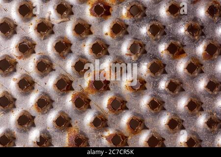 Iron's background rusty grater. Close-up. Macro effect photo Stock Photo