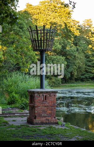 Boultham Park, Lincoln, Originally the park for the Boultham Hall, opened as a public park for the people of Lincoln, Park beacon, Beacon beside lake. Stock Photo