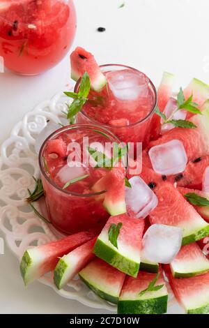 Homemade fresh watermelon drink, summer refreshing smothie with fresh friuts Stock Photo