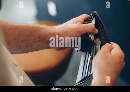 Man hand open an empty wallet on white background Stock Photo by ©mraoraor  129900606