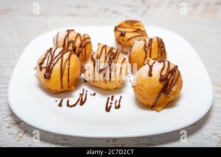 Small donuts with chocolate frosting Stock Photo