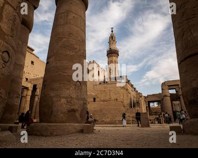 the interior hall of luxor temple with columns and a mosque Stock Photo