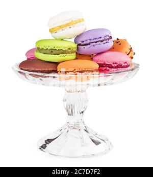 macaroons on a glass cake stand isolated on white Stock Photo