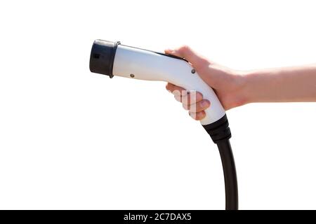Hand with charger for electric car isolated on white background  Stock Photo